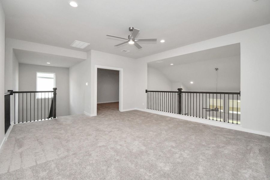 Another view of the game room. Sample photo of completed home with similar floor plan. Actual colors and selections may vary. Another view of the game room. Sample photo of completed home with similar floor plan. Actual colors and selections may vary.