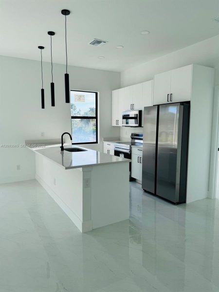 Furnished interior view inside a new home in , Lehigh Acres (Image 5). Furnished interior view inside a new home in , Lehigh Acres (Image 5).