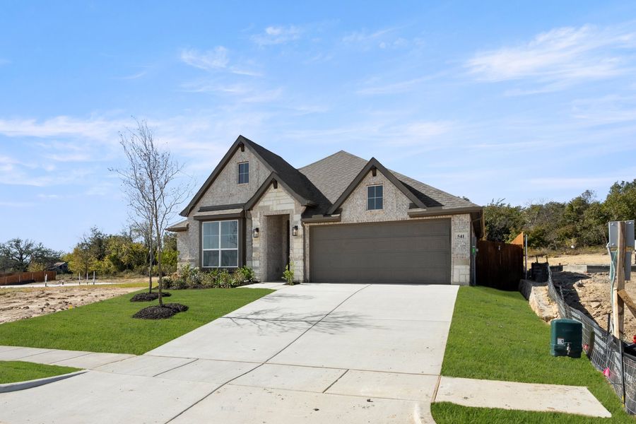 Front exterior of a new home in Waterford Park, Weatherford, TX, highlighting curb appeal (Image 21).