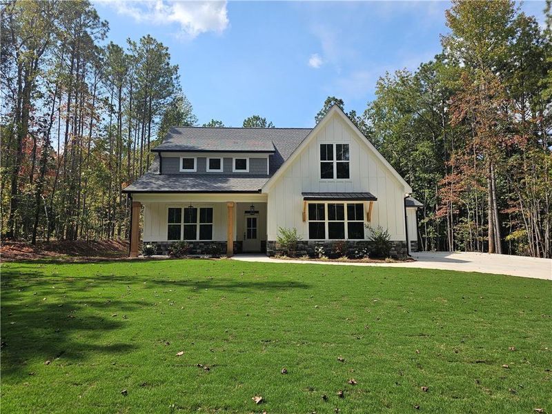 Front exterior of a new home in , Douglasville, GA, highlighting curb appeal (Image 26).