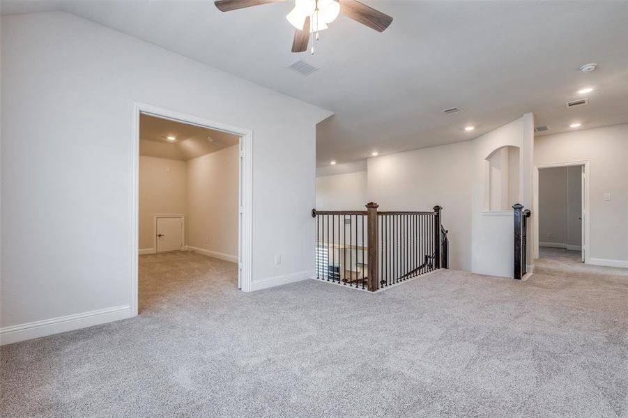 Unfurnished room featuring carpet floors, recessed lighting, a ceiling fan, and baseboards