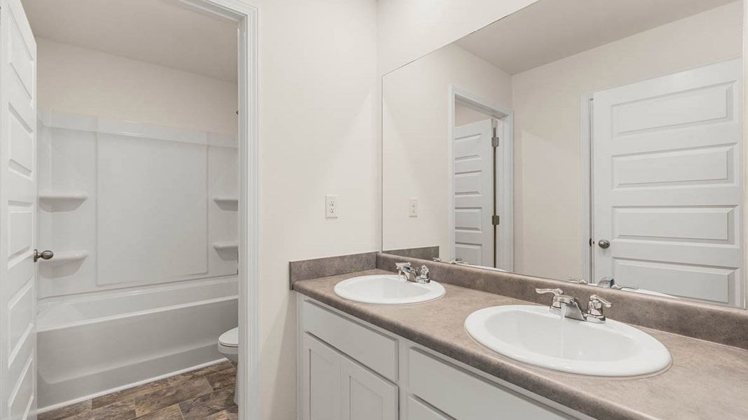 Furnished interior in a model home at Glenmaye in Hampton (Image 13). Furnished interior in a model home at Glenmaye in Hampton (Image 13).