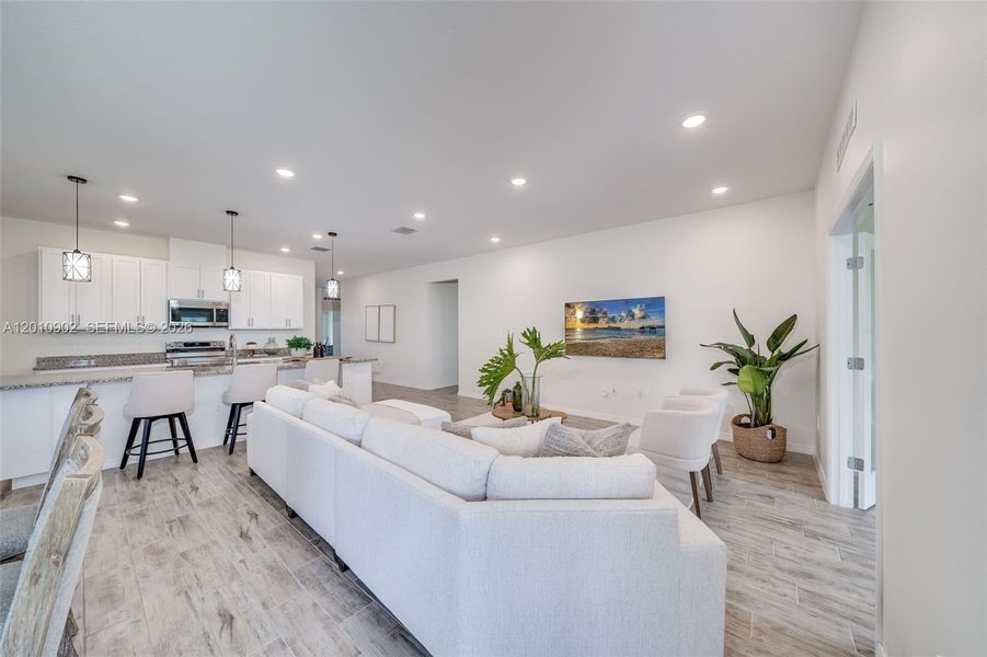 Furnished interior view inside a new home in , Port St. Lucie (Image 38).
