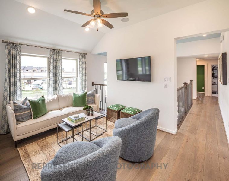 Furnished interior view inside a new home in Bridgeland Central: The Cottages, Cypress (Image 9).