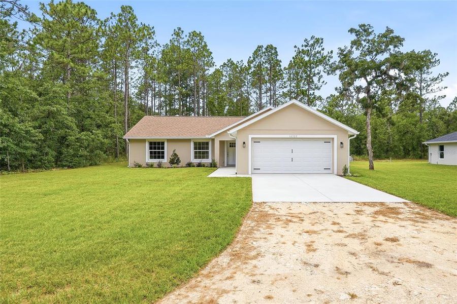 Front exterior of a new home in , Brooksville, FL, highlighting curb appeal (Image 1). Front exterior of a new home in , Brooksville, FL, highlighting curb appeal (Image 1).