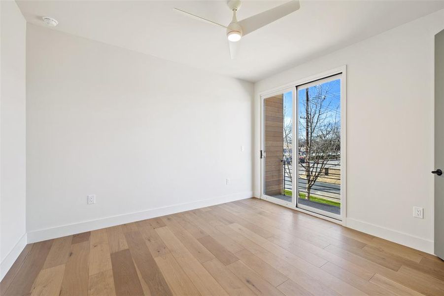 The upper-floor third bedroom showcases a harmonious blend of style and functionality, providing a welcoming retreat for guests or family members.