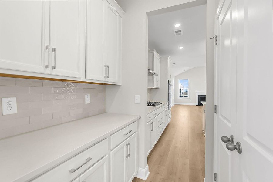 Furnished interior view inside a new home in Tidewater at Lakes of Cane Bay, Summerville (Image 9).