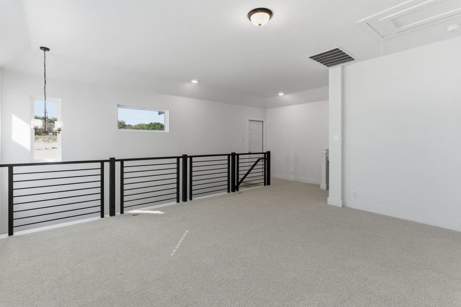 Spacious, unfurnished interior of a new home in Centero at Stone Oak, San Antonio (Image 26).