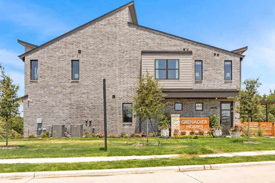 Front exterior of a new home in Willow Grove Townhomes, Melissa, TX, highlighting curb appeal (Image 2). Front exterior of a new home in Willow Grove Townhomes, Melissa, TX, highlighting curb appeal (Image 2).