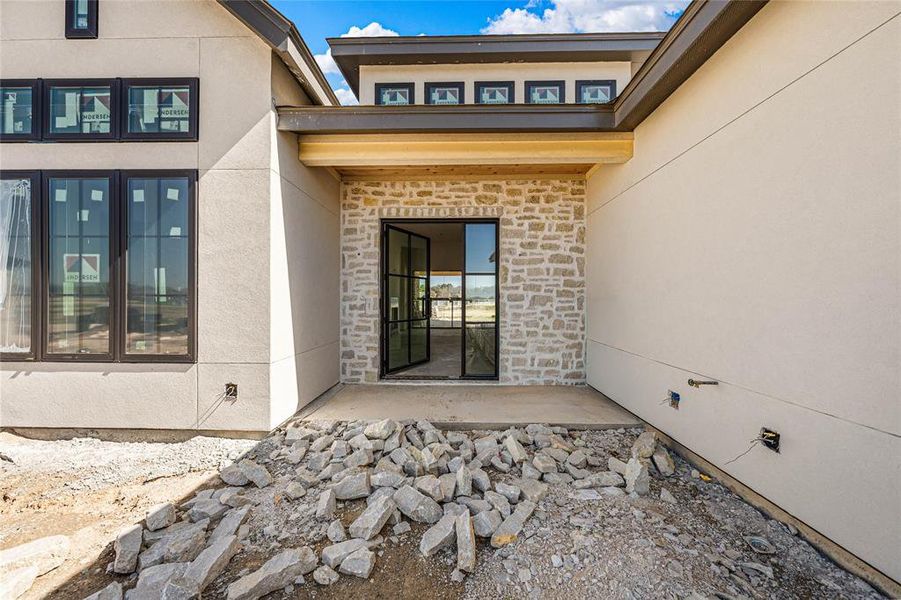 Exterior details and patio area of a home in , Woodway (Image 11).