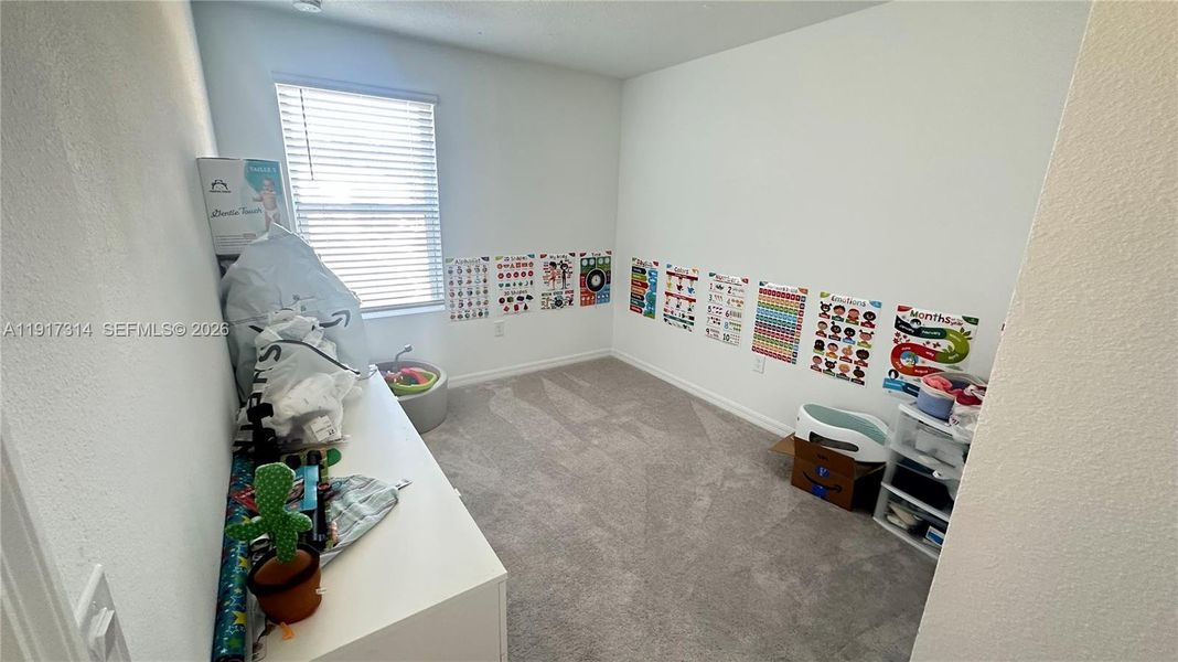 Furnished interior view inside a new home in The Townhomes at Bellalago, Kissimmee (Image 12).