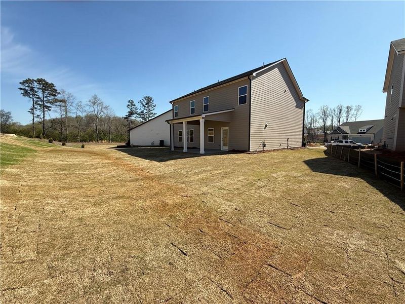 Exterior details and patio area of a home in Ponderosa Farms Estates, Gainesville (Image 3). Exterior details and patio area of a home in Ponderosa Farms Estates, Gainesville (Image 3).