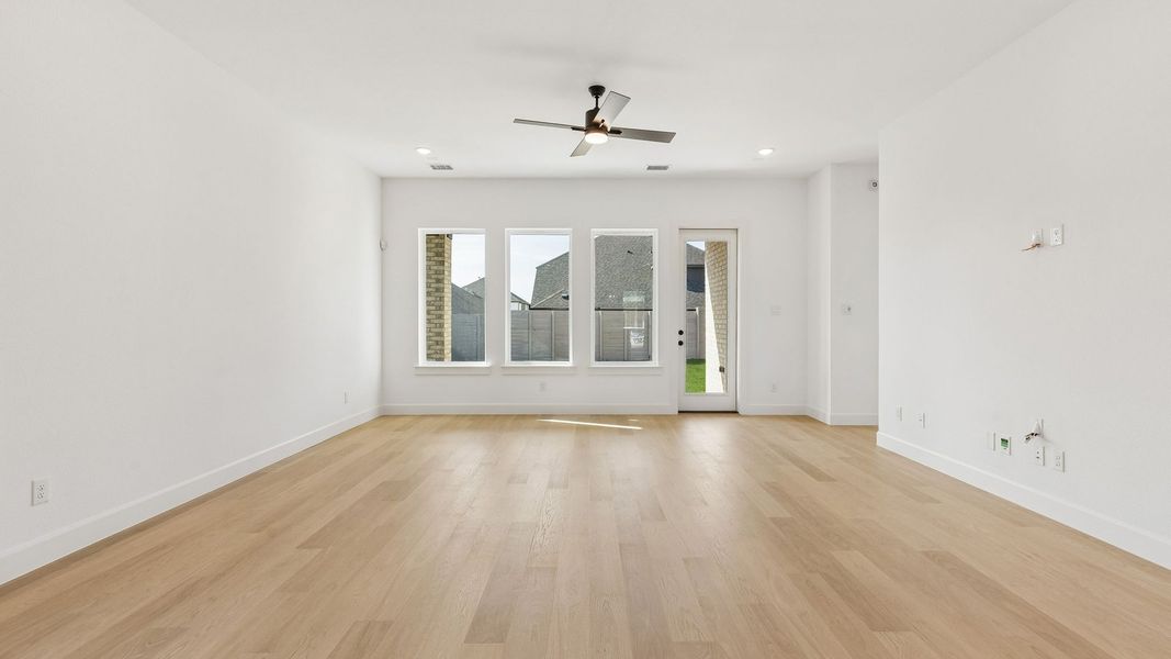 Representative unfurnished interior of a home built from the Chapelle III by Normandy Homes in Rainwater Crossing, Celina (Image 18).