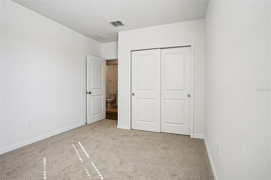 Spacious, unfurnished interior of a new home in Ridgehaven - Villas, Ormond Beach (Image 37).