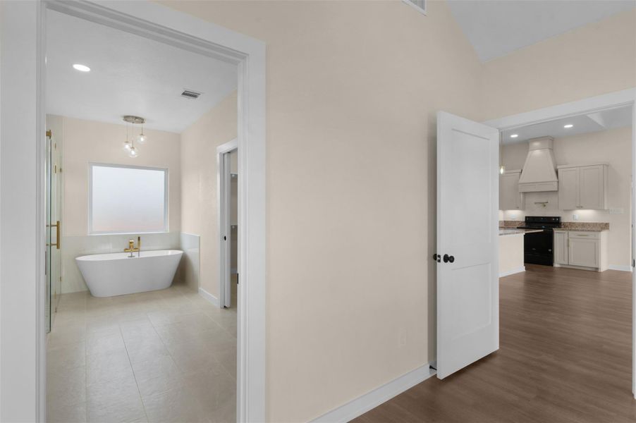 Exiting Primary to Living and Entry to Primary Bathroom