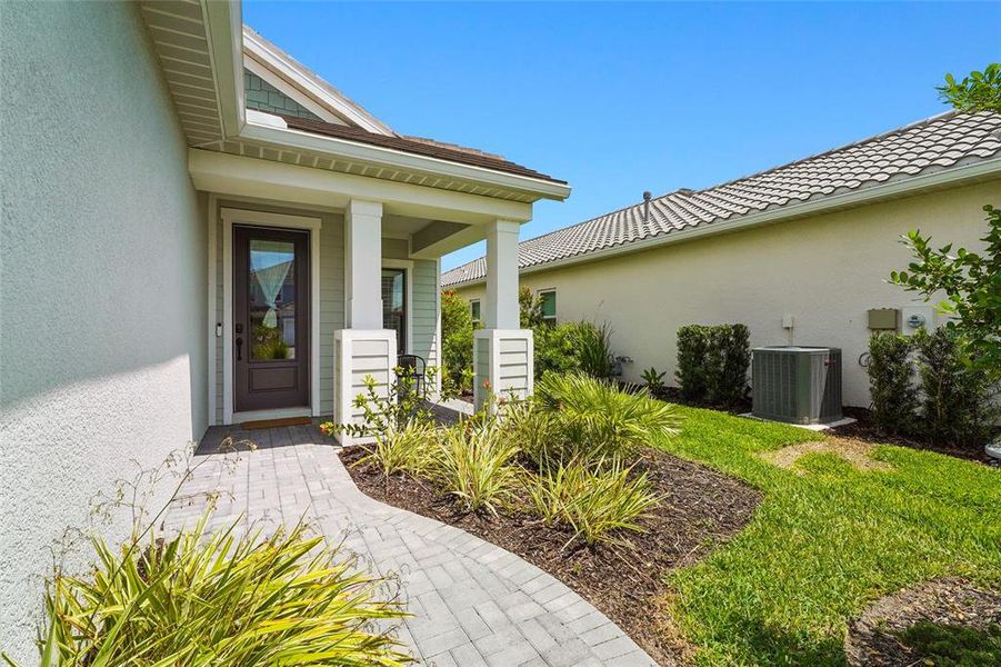 Exterior details and patio area of a home in , Sarasota (Image 38).