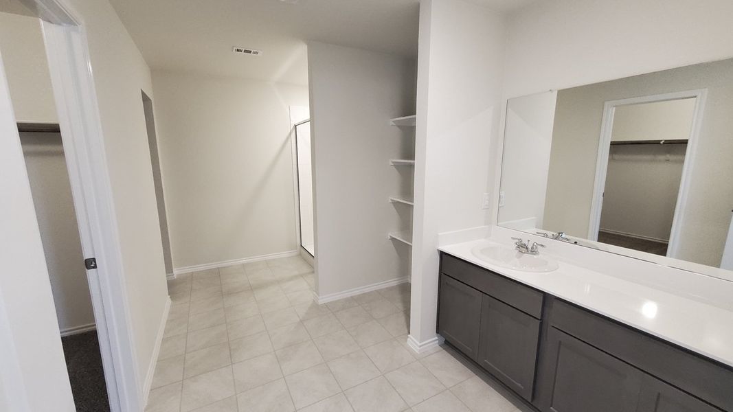 Representative furnished interior of a home built from the X40S Seabrook by D.R. Horton in Valor Farms, Royse City (Image 5).