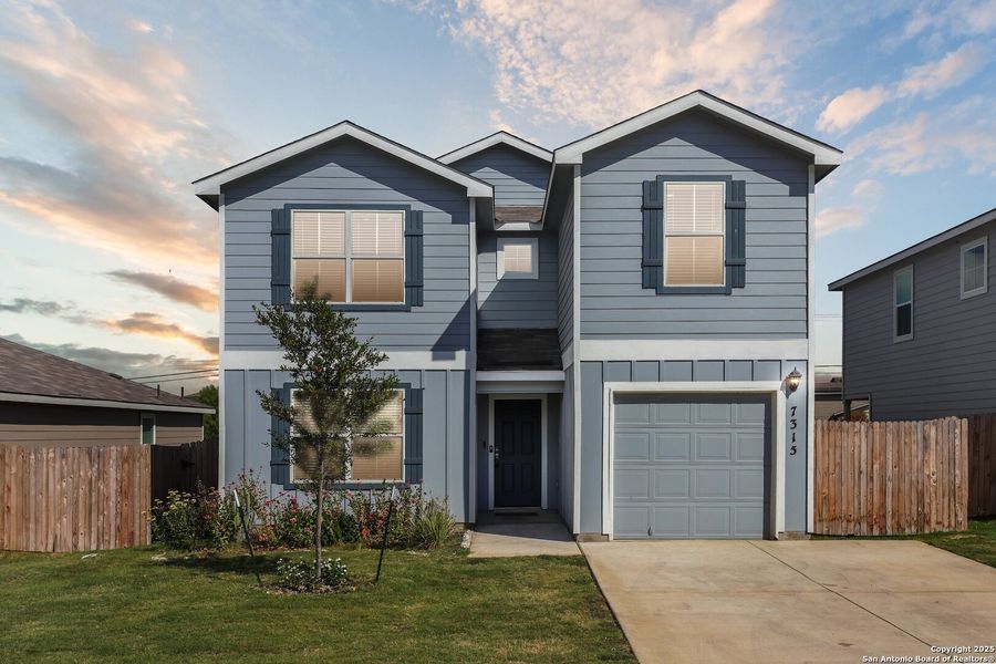 Front exterior of a new home in Solana Ridge, San Antonio, TX, highlighting curb appeal (Image 1). Front exterior of a new home in Solana Ridge, San Antonio, TX, highlighting curb appeal (Image 1).