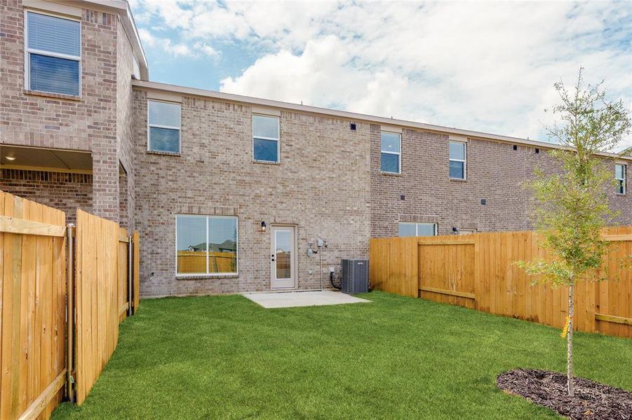 This is an example of the backyard at 726 Carson Lane. All backyards are fenced, landscaped, and have a concrete patio. This is an example of the backyard at 726 Carson Lane. All backyards are fenced, landscaped, and have a concrete patio.
