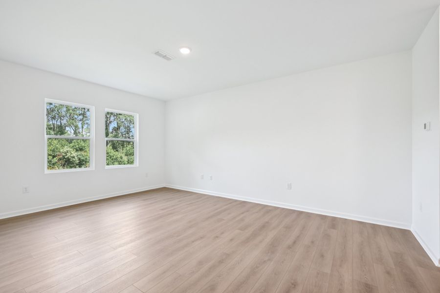 Representative unfurnished interior of a home built from the Meadow by Ashton Woods in Middleton Farms, Middlesex (Image 13).
