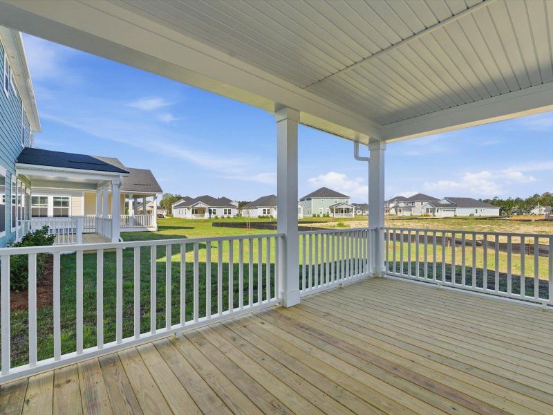 Exterior details and patio area of a home in The Coves at Lakes of Cane Bay, Summerville (Image 3).