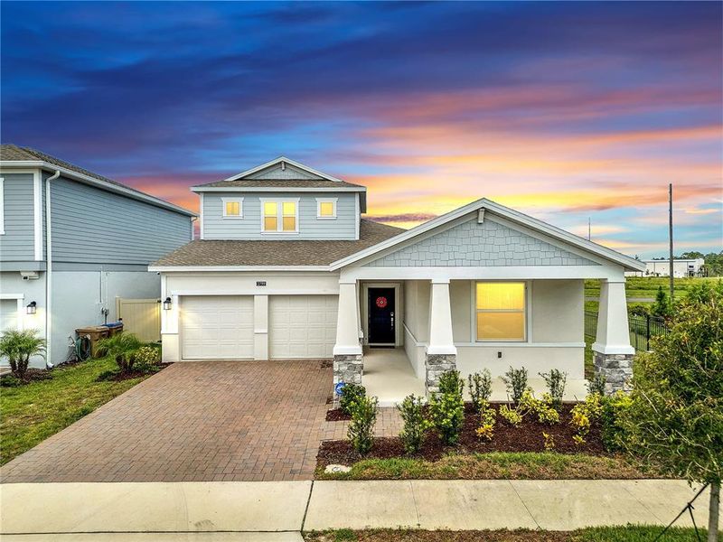 Front exterior of a new home in , St. Cloud, FL, highlighting curb appeal (Image 2).