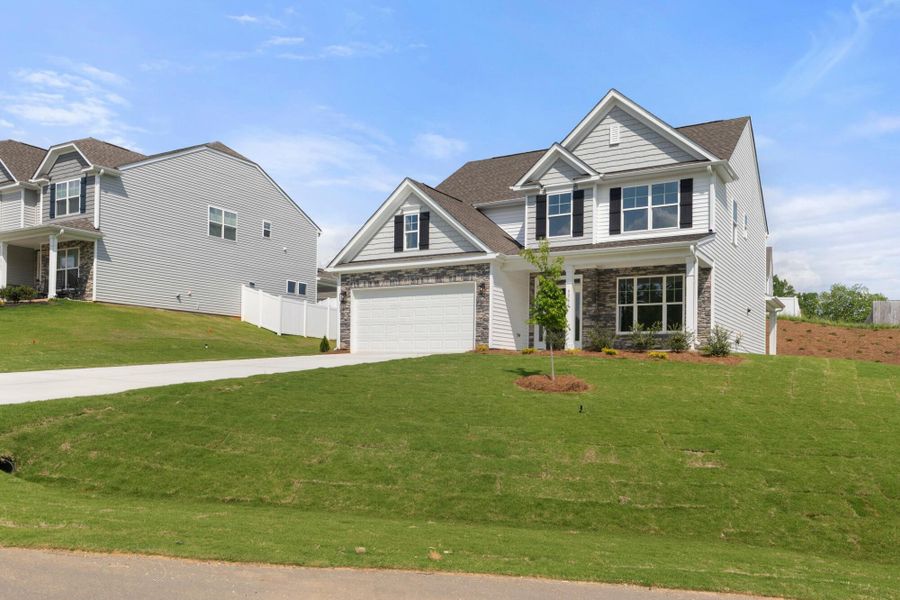 Front exterior of a new home in Cottages at Piper Village, Trinity, NC, highlighting curb appeal (Image 21).