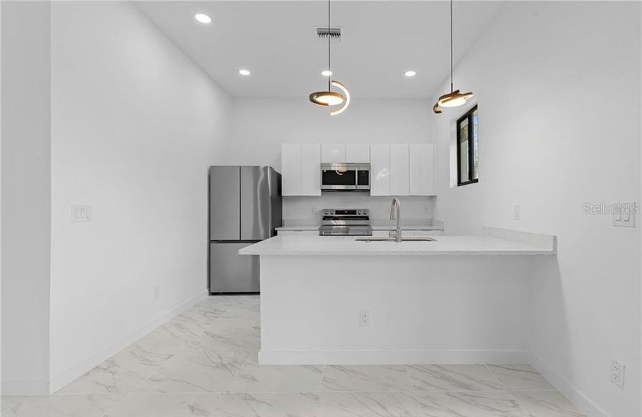 Furnished interior view inside a new home in , Lehigh Acres (Image 10).