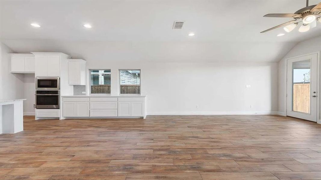 Spacious, unfurnished interior of a new home in Devonshire - Reserve 50', Forney (Image 12).
