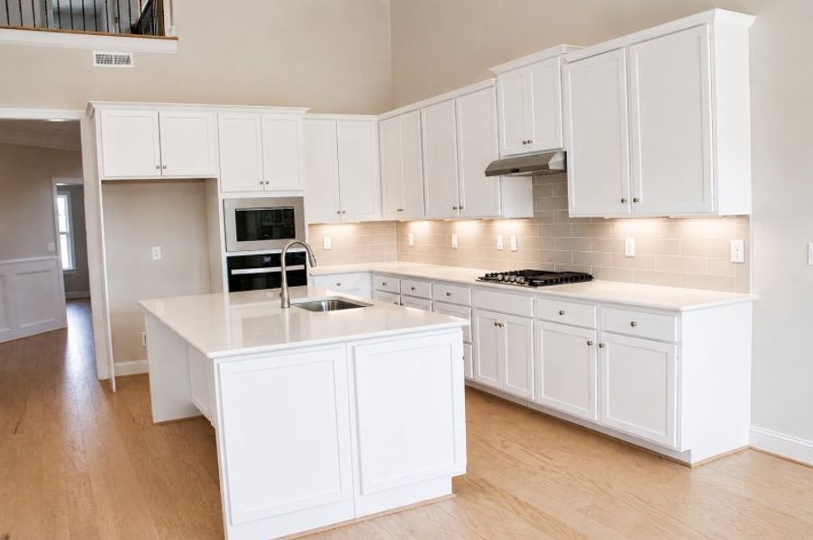 Furnished interior view inside a new home in Weybridge, Burlington (Image 6).