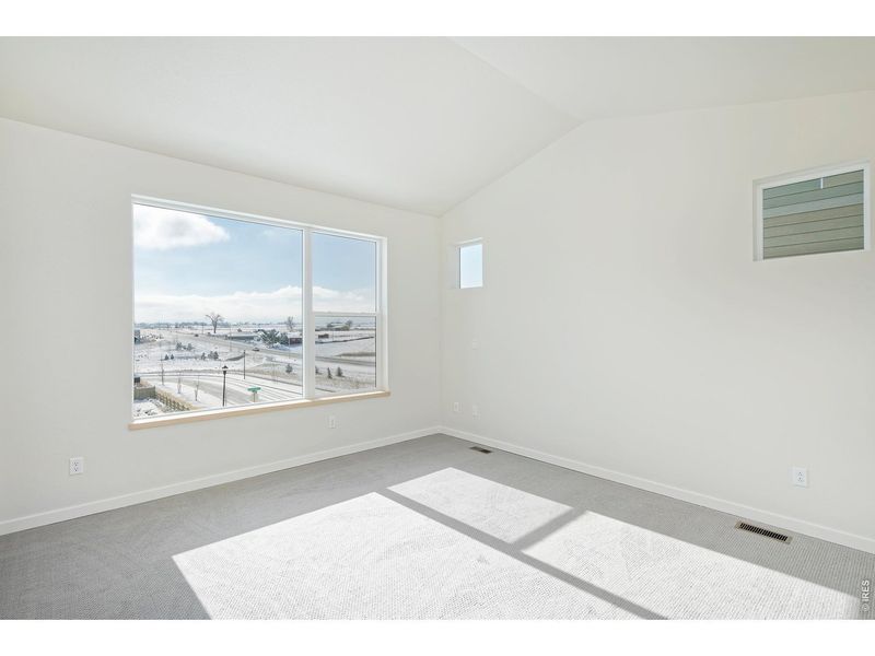 Spacious, unfurnished interior of a new home in West Grange, Longmont (Image 13).