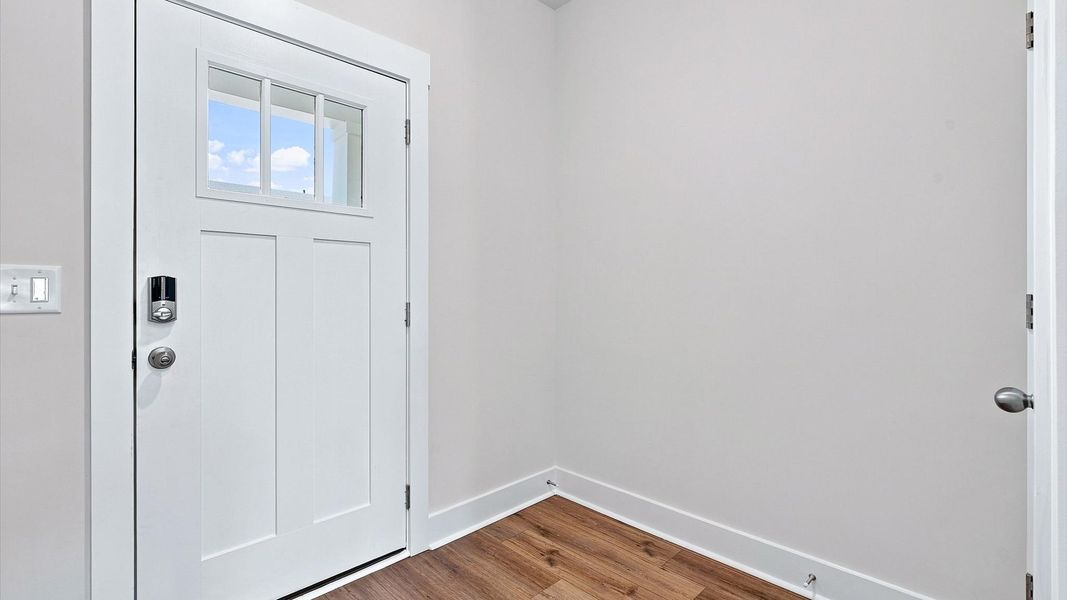 Memorable arrival experience with hardwood floors and elegant trim in the foyer located in Piedmont, SC Memorable arrival experience with hardwood floors and elegant trim in the foyer located in Piedmont, SC