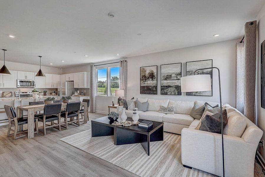 A living room with a large window.