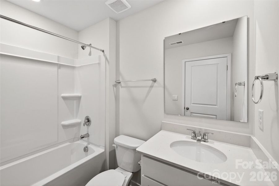 Furnished interior view inside a new home in Reedy Creek Preserve, Charlotte (Image 12).