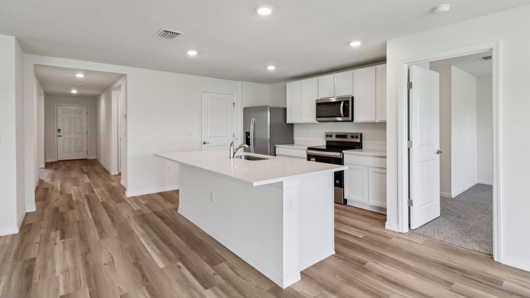 Representative furnished interior of a home built from the Aria by D.R. Horton in Sandal Key, Weeki Wachee (Image 14).