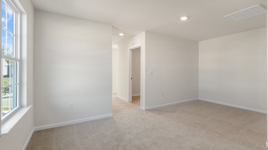 Spacious, unfurnished interior of a new home in The Grove at Matthews Landing, Fuquay Varina (Image 21).
