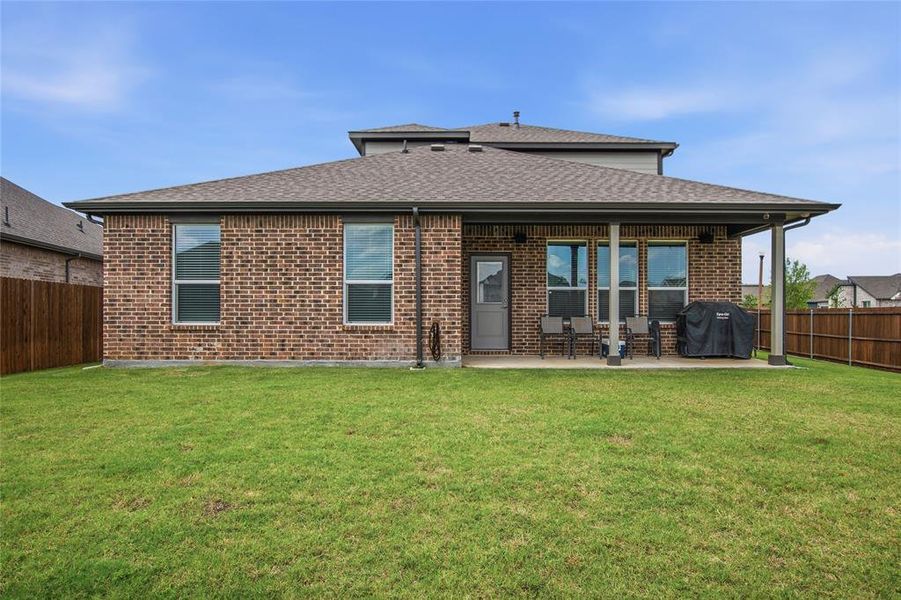 Exterior details and patio area of a home in , Denton (Image 25).