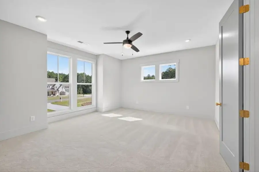 Spacious, unfurnished interior of a new home in The Manors, Jefferson (Image 37).