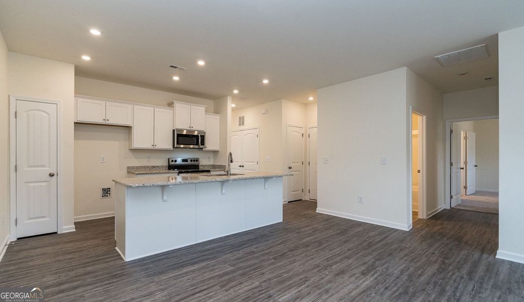 Furnished interior view inside a new home in The Cottages of Silvertown, Thomaston (Image 4).