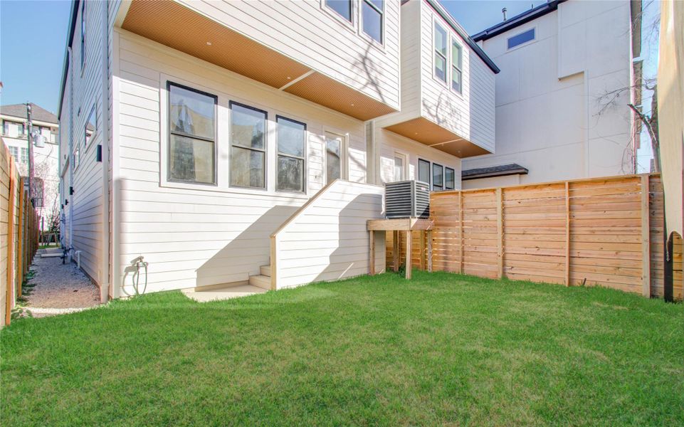 Exterior details and patio area of a home in , Houston (Image 27).