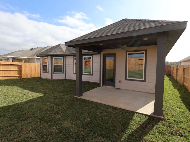 Exterior details and patio area of a home in Lone Star Landing, Montgomery (Image 4).