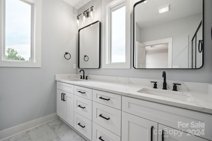 Primary bath with quarts countertops and dual sinks