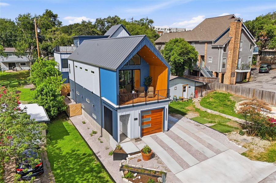 Front exterior of a new home in , Austin, TX, highlighting curb appeal (Image 1). Front exterior of a new home in , Austin, TX, highlighting curb appeal (Image 1).