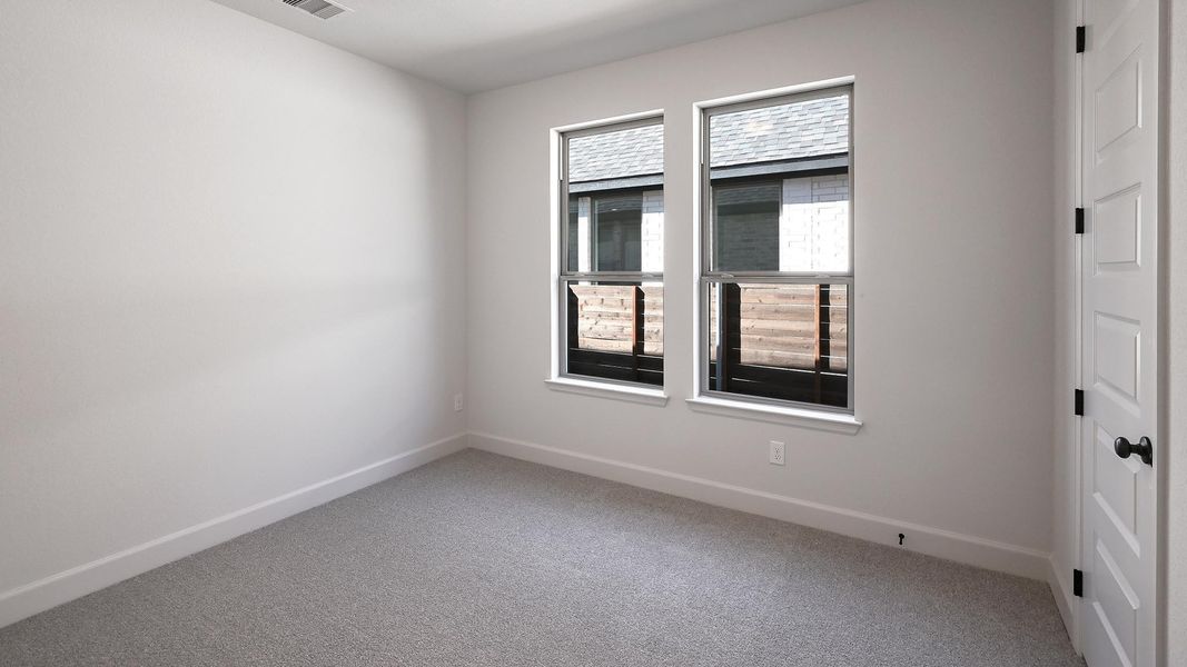 Spacious, unfurnished interior of a new home in Juniper Springs, Lockhart (Image 13).
