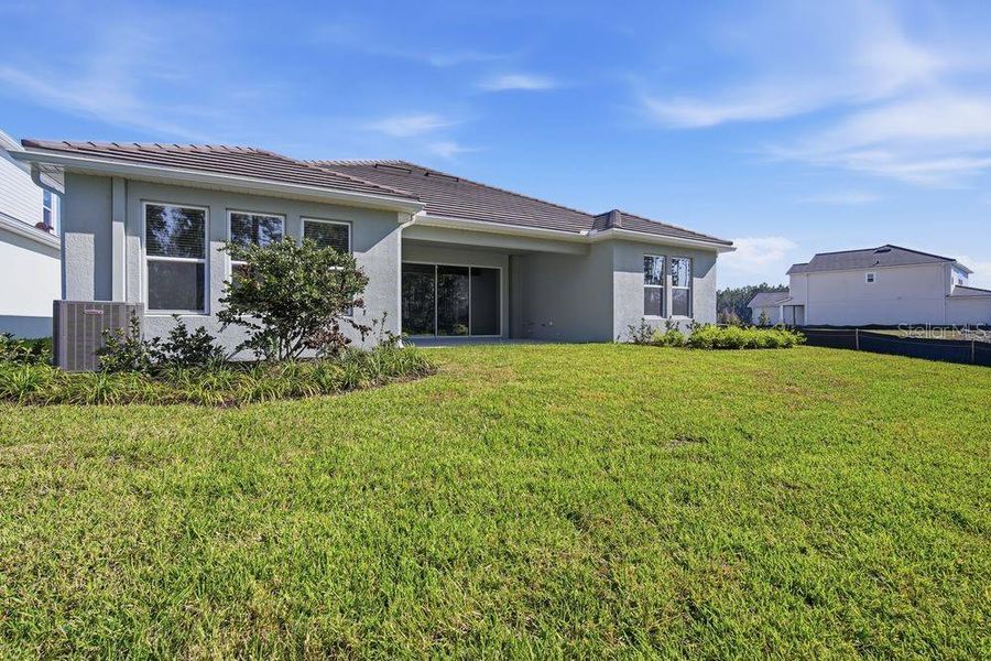 Exterior details and patio area of a home in Hammock at Two Rivers, Zephyrhills (Image 4).