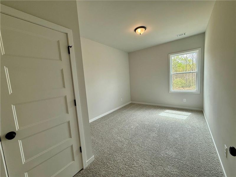 Spacious, unfurnished interior of a new home in Ponderosa Farms Estates, Gainesville (Image 39).