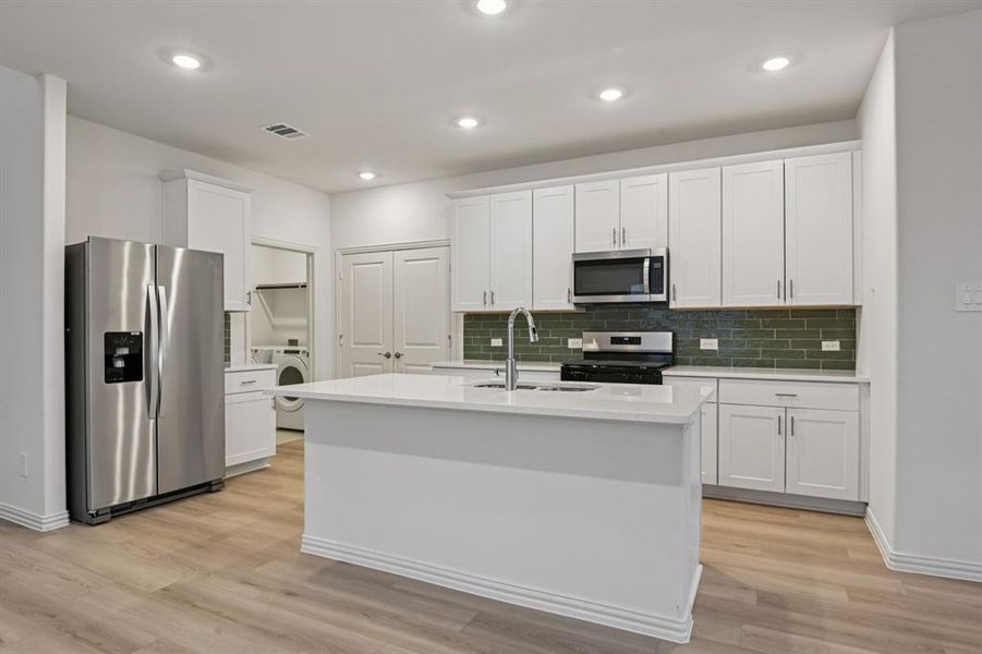 Furnished interior view inside a new home in Lakehaven - Spring Series, Farmersville (Image 9).