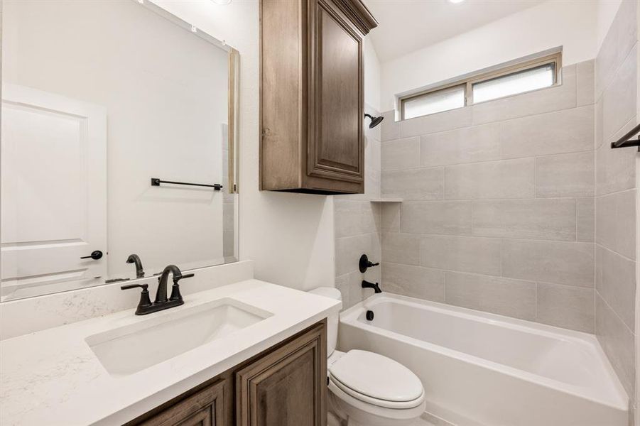 Furnished interior view inside a new home in Villages of Hurricane Creek, Anna (Image 14).