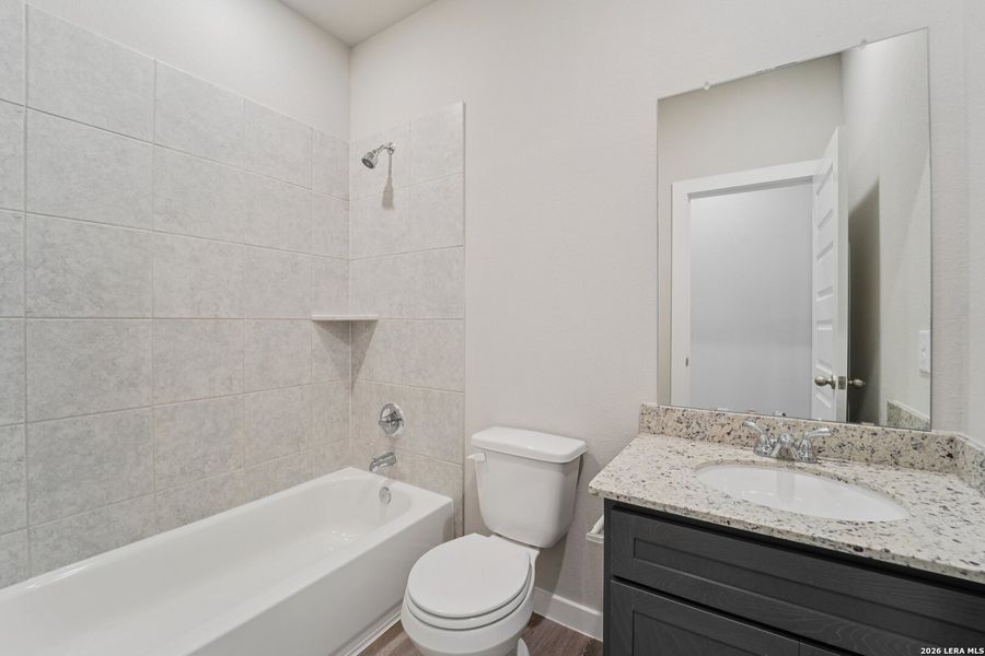Furnished interior view inside a new home in Alamo Estates, San Antonio (Image 6).