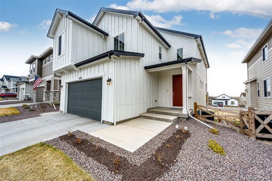 Front exterior of a new home in , Colorado Springs, CO, highlighting curb appeal (Image 25).